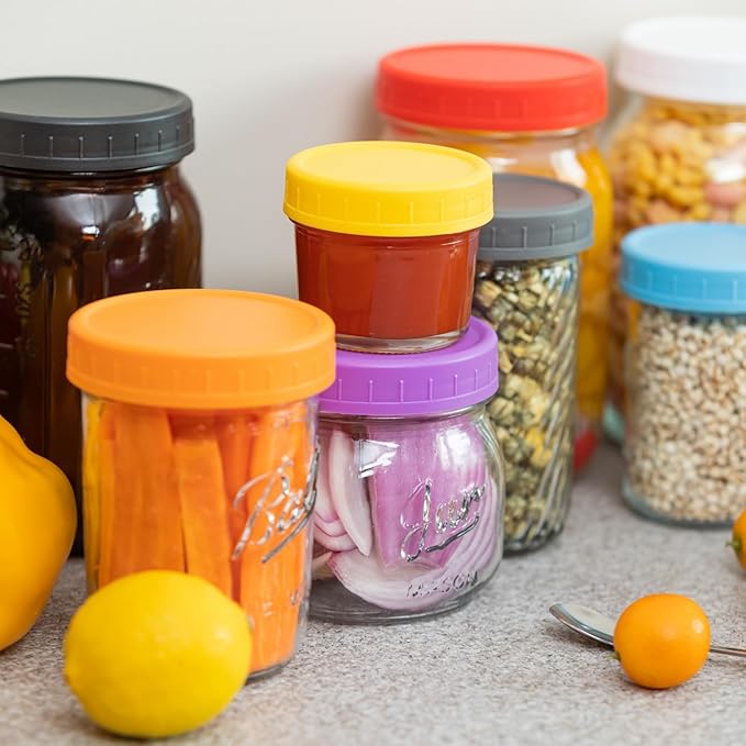 Bedgeta 9 Regular Mouth Mason Jar Lids with Silicone Ring,Thickened Leak-proof Lids Fit Ball,Kerr and More, 9 Orange Plastic, 70mm(Orange)